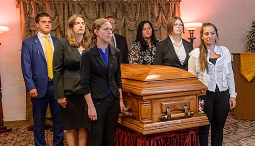 Mortuary Science students at mock funeral